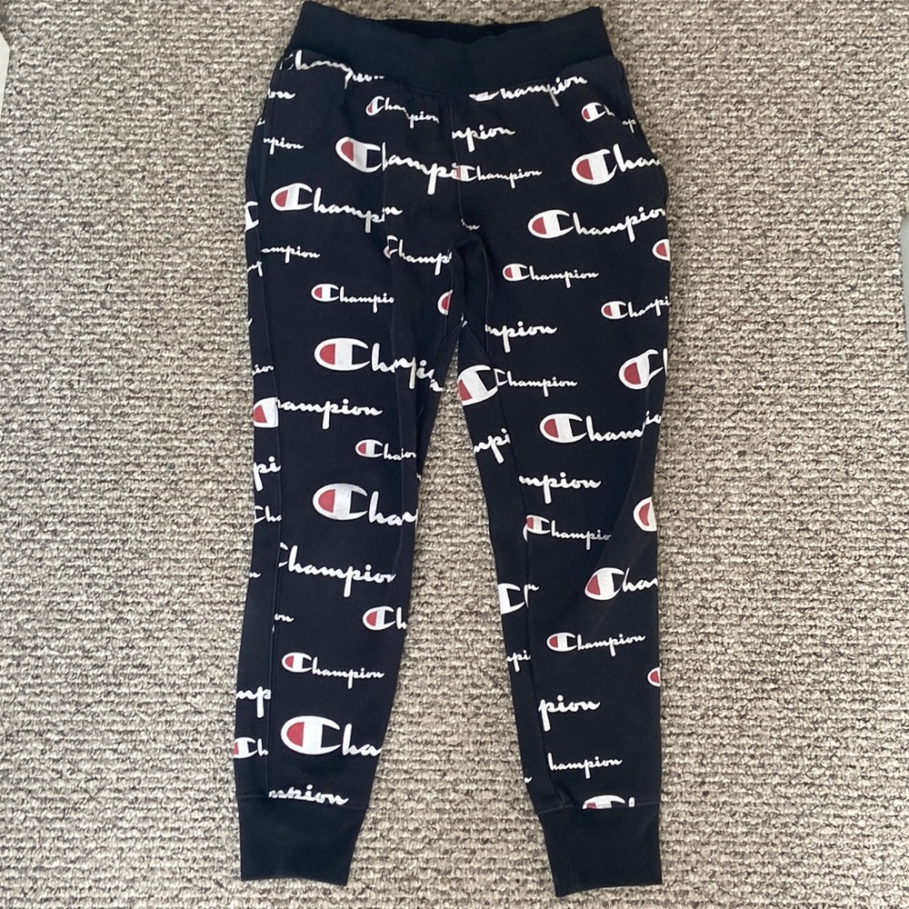 Medium sized Champion sweat pants (Logo all over)